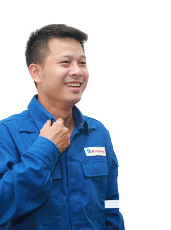 A men ALV's employee in overalls smiles 